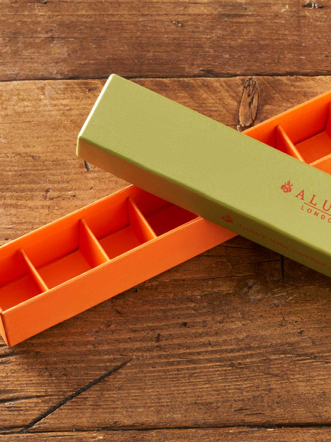 A cardboard box with fence / divider inserts.