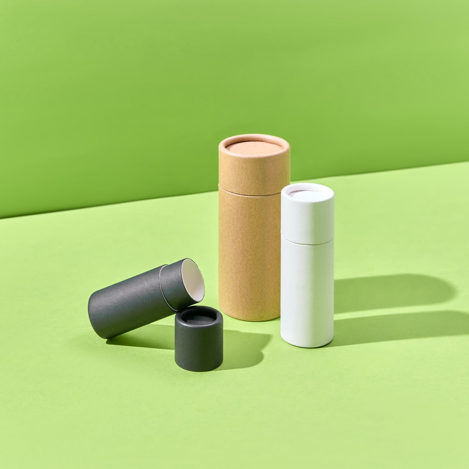 push up tubes with a green background