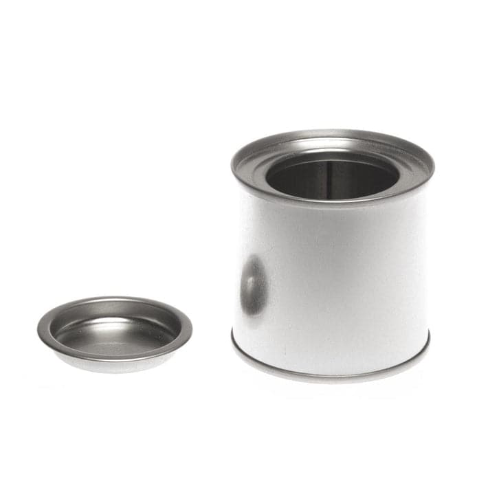 A round silver lever lid tin with the lid off.