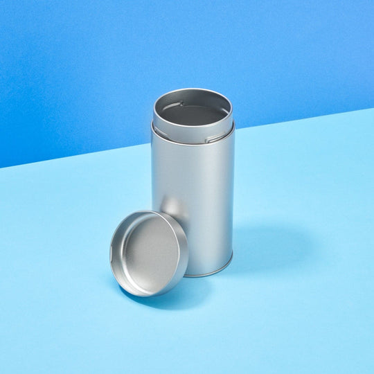 Silver twist lid tinplate tin, shown with lid off.