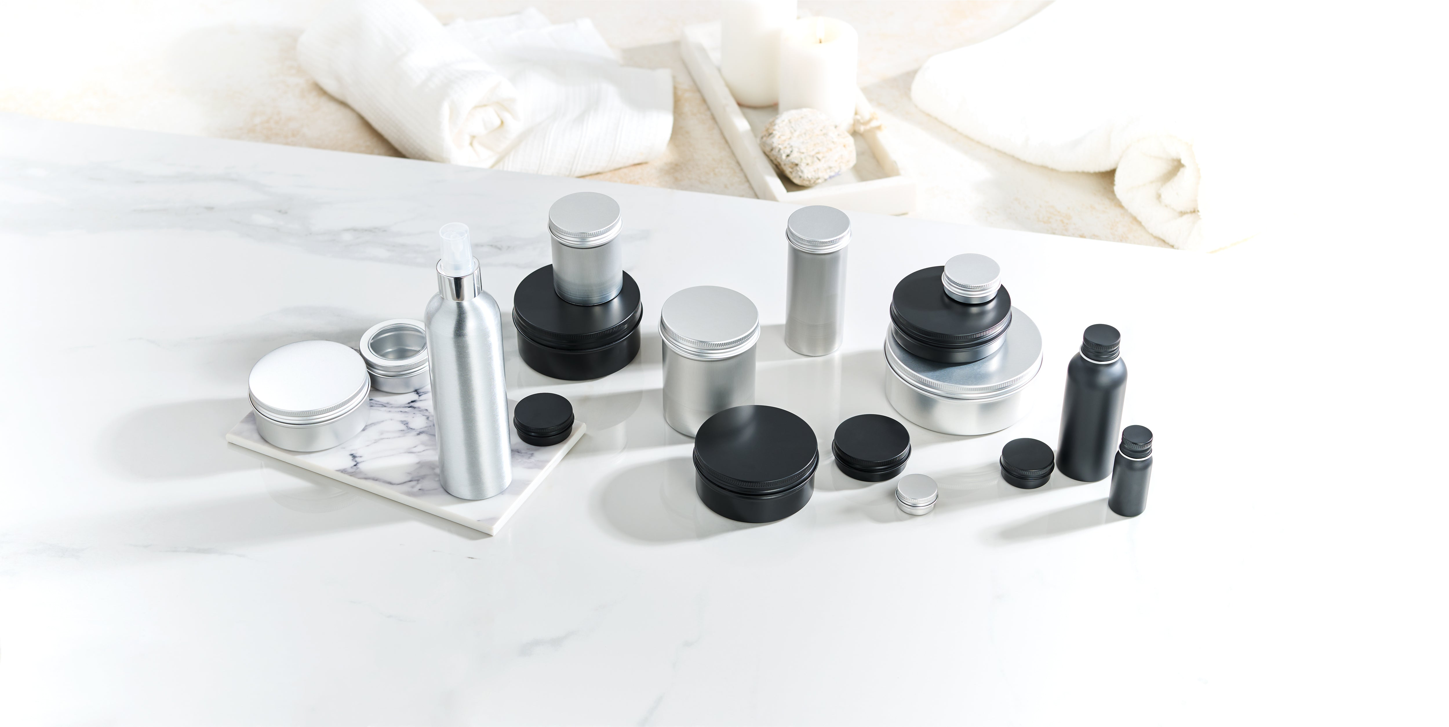 aluminium tins on marble workspace