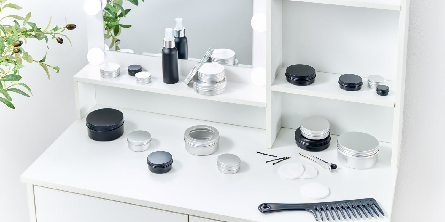 cosmetic tins on a dressing table